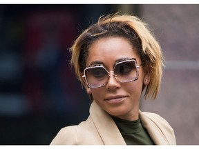 Melanie Brown (Spice Girl Mel B) leaves Los Angeles Superior Court Stanley Mosk Courthouse, in Los Angeles, California, November 9, 2017.  Attorneys for Brown and her estranged husband Stephen Belafonte told Judge Mark Juhas in court November 9, 2017 that they had settled the domestic violence portion of the divorce case. / AFP PHOTO / Robyn BeckROBYN BECK/AFP/Getty Images