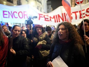 Women demonstrate to call for a legislative change to set a minimum legal age for sexual consent, on November 14, 2017 in front of the Justice ministry in Paris, one week after a jury acquitted a 30-year-old man who was accused of raping an 11-year-old girl in 2009.