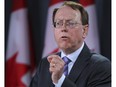 NDP MP Murray Rankin speaks to the media in  Ottawa in this April 9, 2013 file photo. (Andre Forget/Postmedia Network)