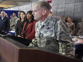 In this Sept. 29, 2017 file photo, academy superintendent Lt. Gen. Jay Silveria speaks about race relations to U.S. Air Force cadets during lunch at the Air Force Academy in Colorado Springs, Colo.