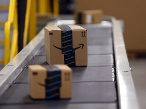 Product moves along the conveyor inside the Amazon Fulfillment Centre in Brampton, Ont. on July 21, 2017.