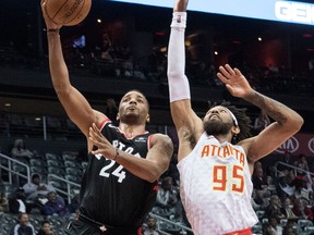 Toronto Raptors forward Norman Powell shoots as Atlanta Hawks forward DeAndre' Bembry defends on Nov. 25, 2017
