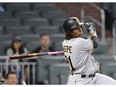 Pittsburgh Pirates second baseman Gift Ngoepe (61) follows through on a game-winning two-run double in the 10th inning of a baseball game against the Atlanta Braves in Atlanta on May 24, 2017.  (THE CANADIAN PRESS/AP, John Bazemore)