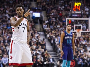 Toronto Raptors guard Kyle Lowry (7) signals a play change in the second half of NBA basketball action against the Charlotte Hornets in Toronto on Wednesday, November 29, 2017. THE CANADIAN PRESS