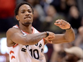 Toronto Raptors guard DeMar DeRozan (10) reacts after sinking a 2-point basket in the final seconds of second half NBA basketball action against the New Orleans Pelicans, in Toronto on Thursday, November 9, 2017. THE CANADIAN PRESS/Nathan Denette