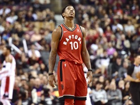 Toronto Raptors guard DeMar DeRozan (10) reacts after missing a shot during second half NBA basketball action against the Washington Wizards in Toronto on Sunday. THE CANADIAN PRESS/Frank Gunn ORG XMIT: FNG618