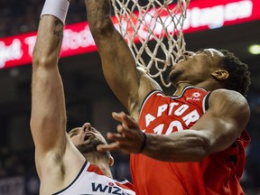 Toronto Raptors guard DeMar DeRozan (10) scores a layup basket in first half NBA basketball action against the Washington Wizards in Toronto on Sunday, November 19, 2017. THE CANADIAN PRESS