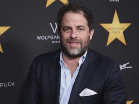 Hollywood's widening sexual harassment crisis ensnared another prominent film director when six women, Including actress Olivia Munn, accused film director Brett Ratner of harassment or misconduct in a Los Angeles Times report, on Wednesday, Nov. 1, 2017. (Willy Sanjuan/Invision/AP/Files)