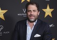 Hollywood's widening sexual harassment crisis ensnared another prominent film director when six women, Including actress Olivia Munn, accused film director Brett Ratner of harassment or misconduct in a Los Angeles Times report, on Wednesday, Nov. 1, 2017. (Willy Sanjuan/Invision/AP/Files)