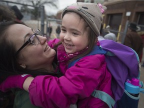 JoAnne Chartier picks up her four-year old daughter, Ellery Chartier-Molinari at Giles Campus French Immersion School on Nov. 21, 2017 a day after Ellery was left on her school bus for three hours after the driver failed to check if the bus was empty.