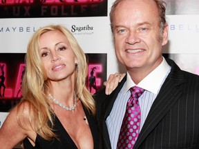 Camille Grammer, seen here with her then-husband Kelsey Grammer in April 2010, has been awarded half of his retirement fund. (Charles Eshelman/Getty Images/Files)
