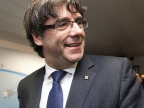 Ousted Catalan President Carles Puigdemont and four ex-regional ministers were taken into custody in Belgium, where he is in hiding. (Olivier Matthys/AP Photo)