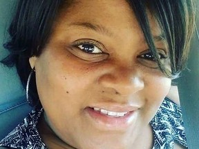 This undated selfie provided by Heather Coggins shows her, a niece of Timothy Coggins. During a court hearing on Wednesday, Nov. 1, 2017, a Georgia prosecutor said Timothy Coggins, a black man, was killed because he had been "socializing with a white female." "It was very difficult hearing some of the things today, and seeing the defendants was very difficult as well," said Heather Coggins, who sat in the courtroom. (Heather Coggins via AP)