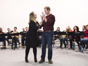 Irene Sankoff, left, and her husband David Hein, who wrote the book, music and lyrics of Mirvish's "Come From Away" hold a meet-and-greet as they prepare to open the musical in early 2018, in Toronto on Thursday, November 30, 2017. THE CANADIAN PRESS/Nathan Denette