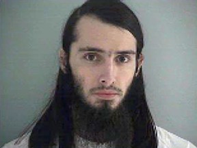 This Jan. 14, 2015, file photo made available by the Butler County Jail in Hamilton, Ohio, shows Christopher Lee Cornell of Green Township in suburban Cincinnati.  (Butler County Jail via AP, File)