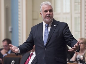 Quebec Premier Philippe Couillard responds during question period Tuesday, September 19, 2017 at the legislature in Quebec City.