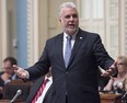 Quebec Premier Philippe Couillard responds during question period Tuesday, September 19, 2017 at the legislature in Quebec City.