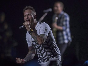 Dallas Smith performs at the Canadian Country Music Association Awards in Saskatoon on September 10, 2017. Smith says he didn't know what to do when "organized violence" broke out at the end of a concert in Dawson Creek, B.C., on Tuesday night, but he doesn't regret calling out concertgoers who caused trouble. (Liam Richards/The Canadian Press)