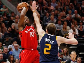 Toronto Raptors' DeMar DeRozan shoots the ball as Utah Jazz's Joe Ingles defends in the first half of an NBA basketball game Friday, Nov. 3, 2017, in Salt Lake City. (AP Photo/Kim Raff)