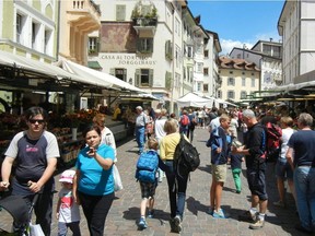 With flower-bedecked windows and a buzzing produce market, the Italian city of Bolzano feels equally Austrian and Italian. DAVE HOERLEIN
