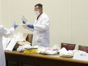Drugs are on display during a news conference in Wuppertal, Germany, Thursday, Nov. 16, 2017. German police have arrested a Dutch man accused of running an international narcotics business from his apartment, after seizing drugs with an estimated street value of 3 million euros ($3.5 million). News agency dpa reported that police and prosecutors in the western city of Wuppertal said Thursday they found 200 kilos (440 pounds) of drugs in the raid at the beginning of this week. They said the suspected dealer’s wares included ecstasy, cannabis-laced chocolate, cocaine and amphetamines. (Claudia Otte/dpa via AP)