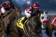 Jockey Rafael Hernandez guides Aheadbyacentury to victory in the 114th running of the Coronation Futurity Stake for owners Jack of Hearts Racing and J.R.Racing and trainer John Ross. (Michael Burns photo)