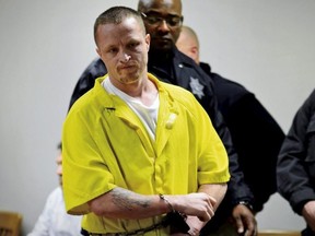 Nicholas Sheley is led into a Whiteside County courtroom Wednesday, Jan. 16, 2013, in Morrison, Ill.