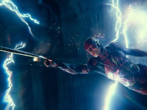 Ezra Miller as The Flash in a scene from "Justice League." (Warner Bros.)