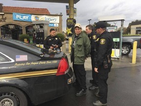 This photo provided by the San Joaquin County Sheriff's office shows Randall Saito being arrested in Stockton, Calif., Wednesday, Nov. 15, 2017.