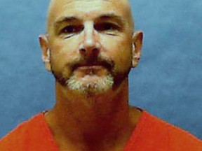 This undated photo made available by the Florida Department of Law Enforcement shows Patrick Hannon under arrest. Hannon, 53, is scheduled to be executed Wednesday, Nov. 8, 2017, for killing two people in 1991. Hannon is the third Florida inmate to be executed since August. The state resumed executions in August following changes made to its death penalty sentencing law, which now requires a unanimous jury vote for a death sentence. (Florida Department of Law Enforcement via AP)