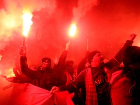 TFC fans celebrate at BMO Field on Wednesday night. (DAVE ABEL/TORONTO SUN)