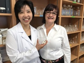 Gastroenterologist Dr. Dina Kao, left, and Karen Shandro are seen in this undated handout photo. When it comes to treating Clostridium difficile with a fecal transplant, yes, human poop, swallowing a frozen capsule appears to have far less of an "ick factor" and works as well as delivering the therapy via colonoscopy, researchers say. THE CANADIAN PRESS/HO, Alberta Health Services, Sharman Hnatiuk