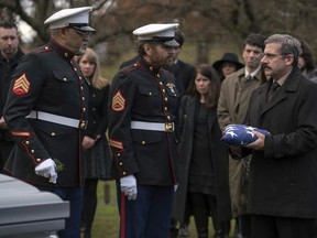 This image released by Lionsgate shows Laurence Fishburne, from left, Bryan Cranston and Steve Carell in a scene from "Last Flag Flying." (Wilson Webb/Lionsgate via AP)