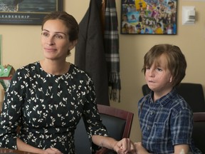 This image released by Lionsgate shows Jacob Tremblay, right, and Julia Roberts in a scene from "Wonder." (Dale Robinette/Lionsgate via AP)