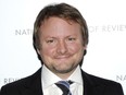 In this Jan. 8, 2013 file photo, screenwriter Rian Johnson attends the National Board of Review Awards gala in New York. The Walt Disney Co. has announced that Johnson will create a new trilogy for the “Star Wars” universe, greatly expanding the director’s command over George Lucas’ ever-expanding space saga. (Photo by Evan Agostini/Invision/AP, File)