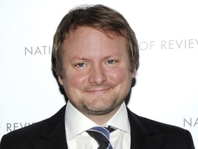 In this Jan. 8, 2013 file photo, screenwriter Rian Johnson attends the National Board of Review Awards gala in New York. The Walt Disney Co. has announced that Johnson will create a new trilogy for the “Star Wars” universe, greatly expanding the director’s command over George Lucas’ ever-expanding space saga. (Photo by Evan Agostini/Invision/AP, File)