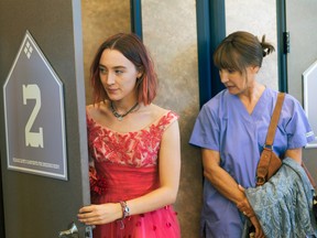 This image released by A24 Films shows Saoirse Ronan, left, and Laurie Metcalf in a scene from "Lady Bird." (Merie Wallace/A24 via AP)