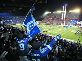 Argos fans whoop it up prior to the start of the 2004 Grey Cup game at Frank Clair Stadium in Ottawa. It was the only Cup appearance for Kevin Eiben in his CFL playing career. (Postmedia files)