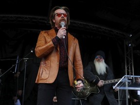 Jesse Hughes, left, lead singer of the U.S band Eagles of Death Metal and guitarist Dave Catching perform at Paris 11th district town hall, Monday, Nov. 13, 2017, during a ceremony held for the victims of the Paris attacks. Members of California rock band Eagles of Death Metal are giving a surprise performance in Paris to mark two years since Islamic extremists stormed the group's concert in Paris. (Philippe Wojazer, Pool via AP) ORG XMIT: PAR130

POOL IMAGE
Philippe Wojazer, AP