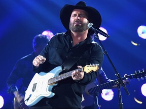 Garth Brooks performs at the 51st annual CMA Awards at the Bridgestone Arena on November 8, 2017 in Nashville.