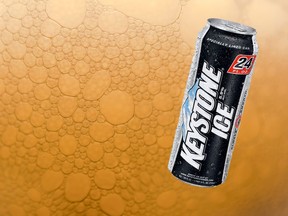 This stock photo shows a can of Keystone Ice beer over beer suds.