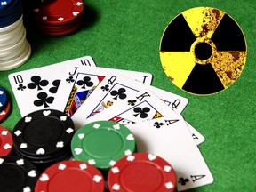 In this stock photo, a royal flush poker hand sits on a card table with poker chips.