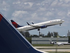 A Delta airlines plane is seen as it takes off at the Fort Lauderdale-Hollywood International Airport on July 14, 2016 in Fort Lauderdale, Florida.(Photo by Joe Raedle/Getty Images)