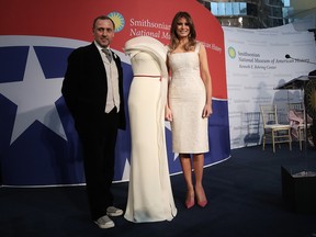 U.S. first lady Melania Trump and fashion designer Herve Pierre attend an event at the Smithsonian National Museum of American History where the first lady donated her inaugural gown to the museum October 20, 2017 in Washington, DC. The first lady said, 'Today is such an honor as I dedicate my inaugural couture piece to the First Ladies exhibit at the National Museum of American History.' (Photo by Win McNamee/Getty Images)