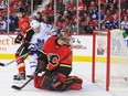 Mike Smith of the Calgary Flames watches the shot of Nikita Zaitsev (not pictured) of the Toronto Maple Leafs fly past him during an NHL game at Scotiabank Saddledome on Nov. 28, 2017 in Calgary. (Derek Leung/Getty Images)