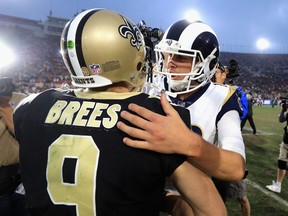 Jared Goff of the Los Angeles Rams shakes hands with Drew Brees of the New Orleans Saints on Nov. 26, 2017