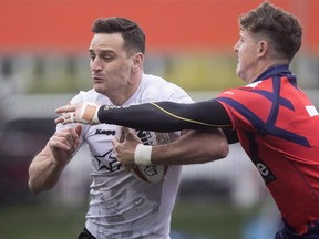 Captain Craig Hall (left) was granted an early release by the Toronto Wolfpack for family reasons. (THE CANADIAN PRESS)