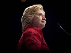 In this July 30, 2016 file photo, U.S. Democratic presidential candidate Hillary Clinton pauses while speaking at a rally in Pittsburgh during a bus tour through the rust belt. (Andrew Harnik/AP Photo/Files)