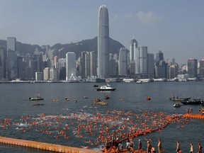 FILE - In this Sunday, Oct. 29, 2017 file photo, competitors swim during the annual 1-kilometer (0.6-mile) harbor race at the Victoria Harbour in Hong Kong. Hong Kong is set to retain its status as the city most visited by international travelers this year in spite of strained relations with mainland China. In a report published Tuesday, Nov. 7, market research firm Euromonitor International said it estimates 25.7 million arrivals in Hong Kong this year, down 3.2 percent on 2016. (AP Photo/Vincent Yu, file) ORG XMIT: LON122

SUNDAY, OCT. 29, 2017 FILE PHOTO
Vincent Yu, AP