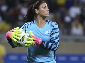 Hope Solo, the former goalkeeper for the U.S. women's national team, accused former FIFA President Sepp Blatter of grabbing her rear at the Ballon d'Or awards in 2013 in Zurich. (Eugenio Savio/AP Photo/Files)